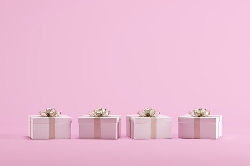 粉紅色背景上的禮品盒的觀點圖片素材