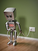 一个小机器人充电的插图图片素材