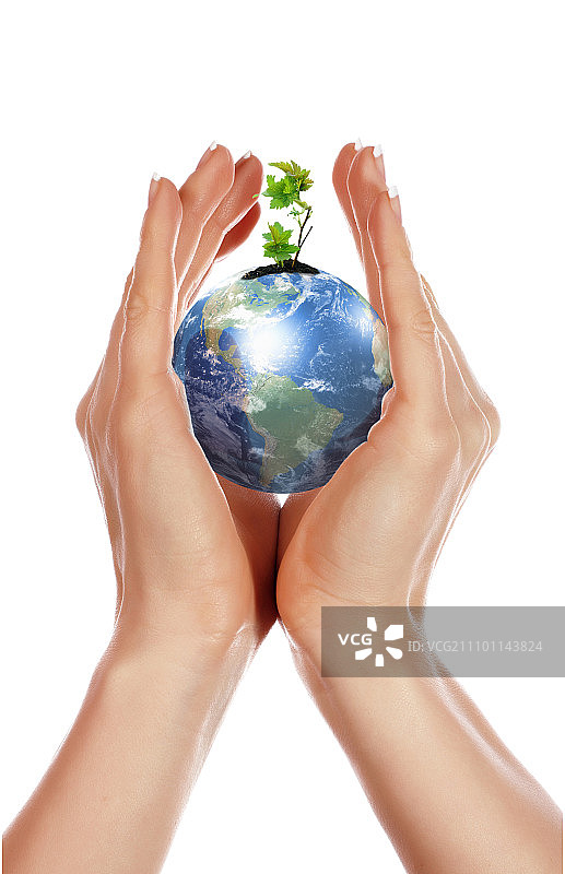 手，嫩芽和我们的星球地球图片素材