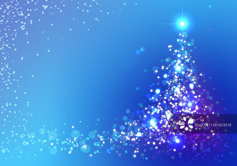 圣诞贺卡。概念蓝色图像与圣诞树的主题图片素材