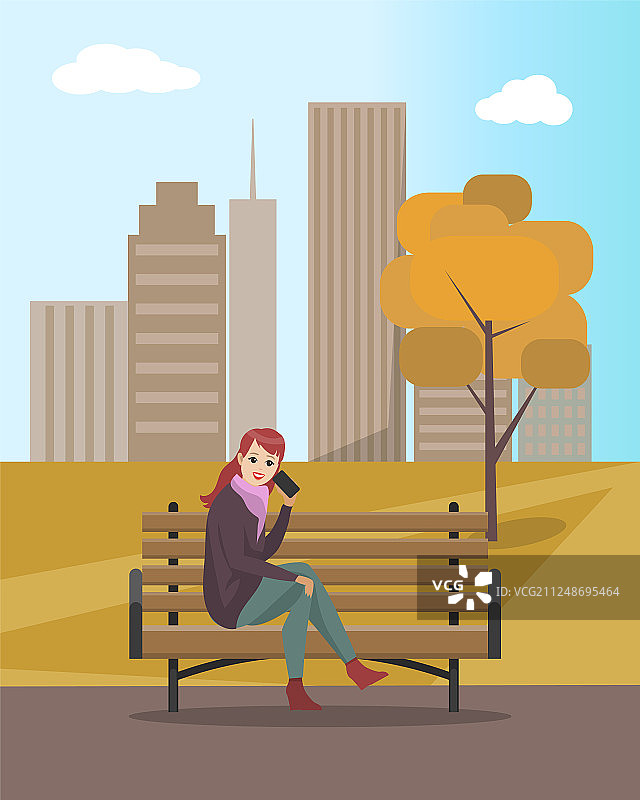 一个女人在长凳上打电话图片素材