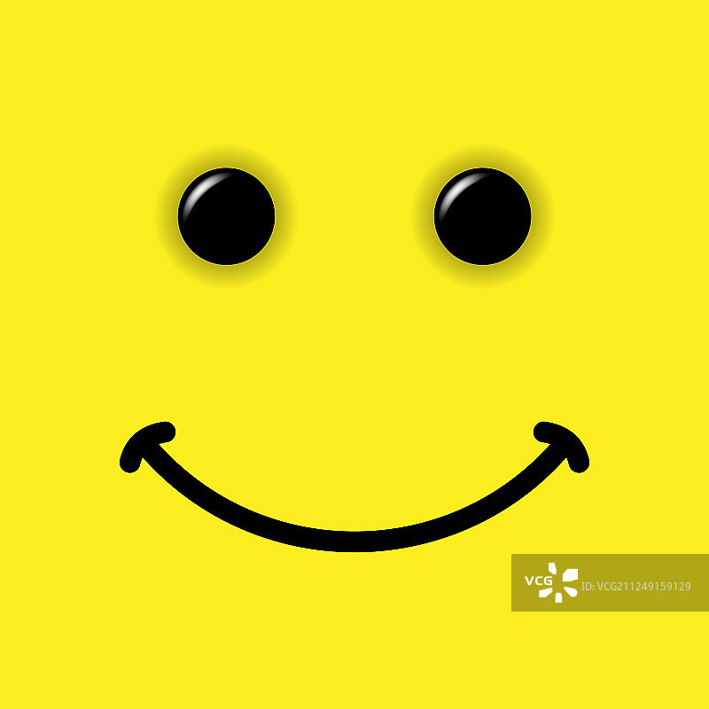 黄色背景上的微笑表情图片素材