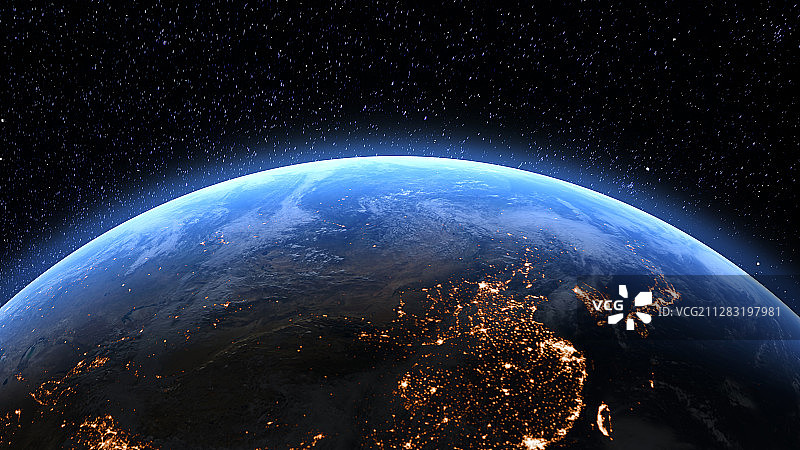星空中蓝色有城市夜景的地球图片素材