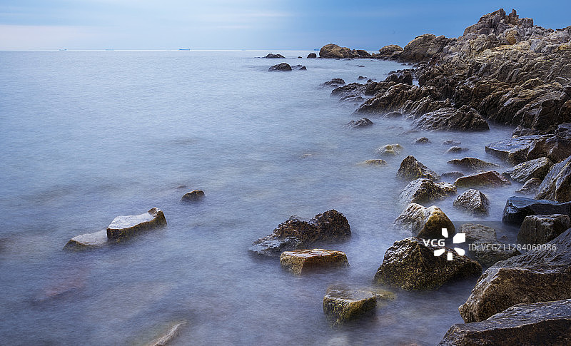 在北戴河海滨使用慢门拍摄的大海与礁石图片素材