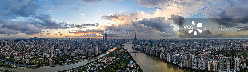 航拍视角下的广州珠江新城-广州塔滨水城市天际线日出晨曦全景图片素材