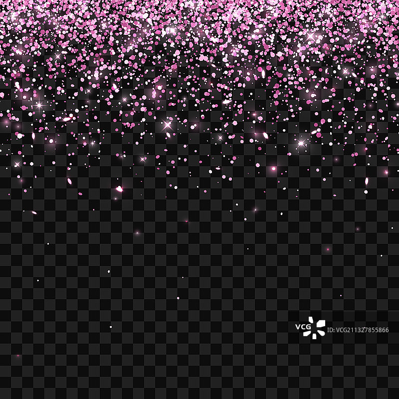 粉红色的闪光粒子落在黑暗中图片素材