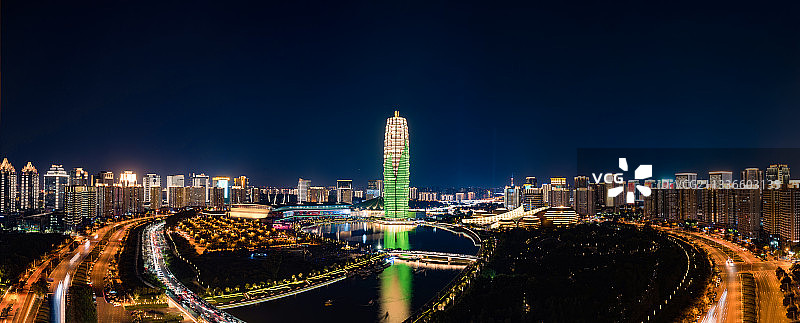 河南地标建筑绿色大玉米城市天际线夜景图片素材