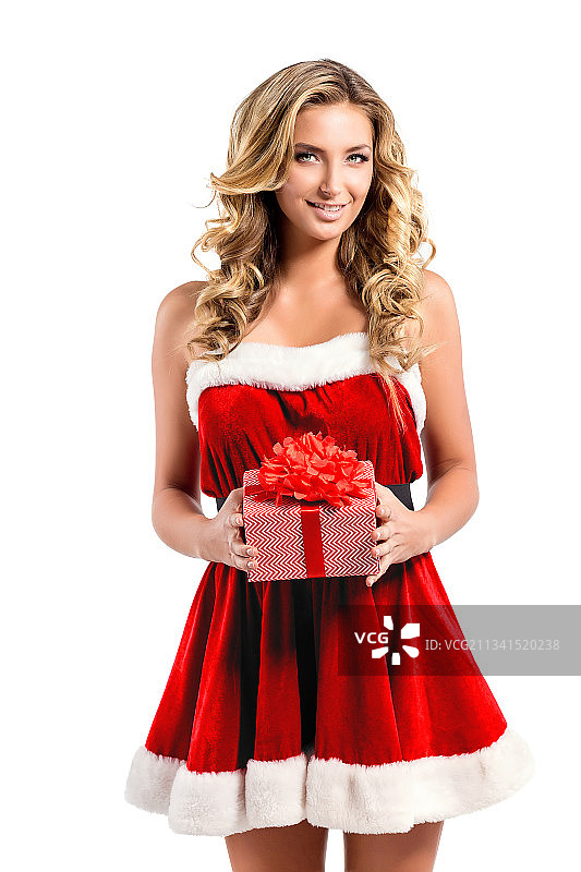 身着红裙的女子站在白色背景下图片素材