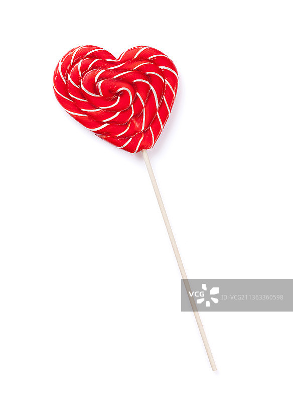 心形棒棒糖，白色背景下心形糖果的特写图片素材