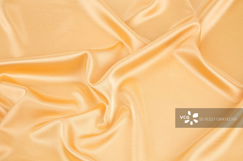 接近摩尔多瓦的黄色丝绸布料纹理图片素材