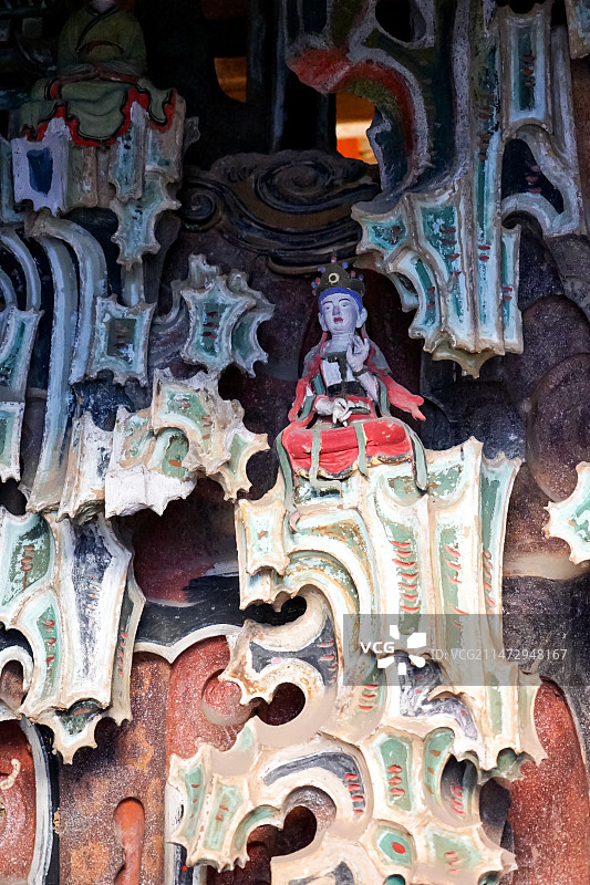 石家庄毗卢寺释迦殿后菩萨塑像五彩悬山图片素材