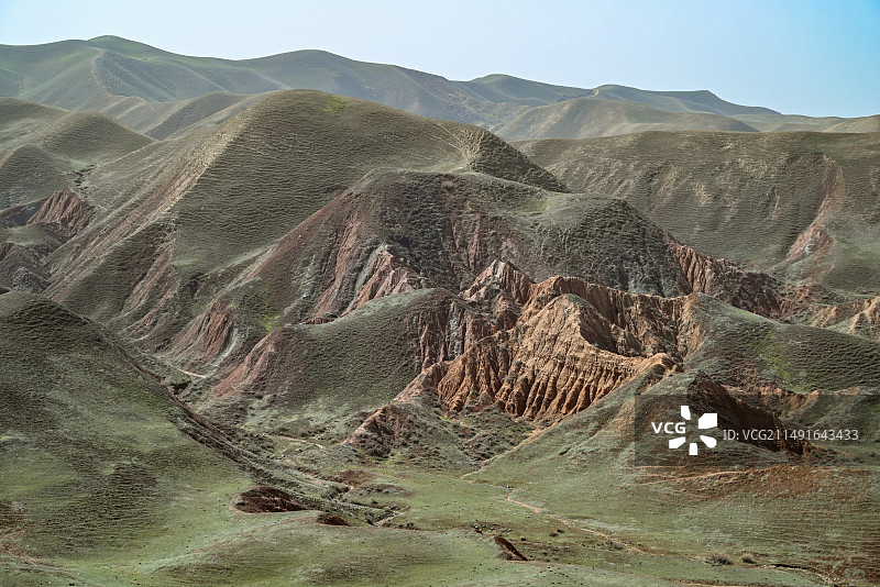 新疆阜康丹霞地貌 高视角俯瞰波浪山脊图片素材