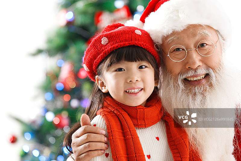 圣诞老人与小女孩过圣诞节图片素材