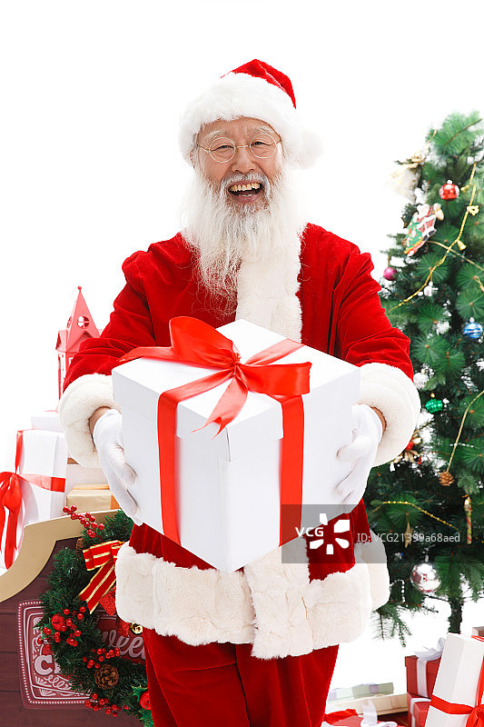 一个圣诞老人在派发圣诞礼物图片素材