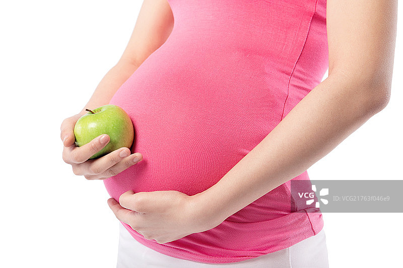 手拿苹果的孕妇图片素材