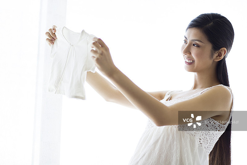 孕妇和婴儿衣服图片素材