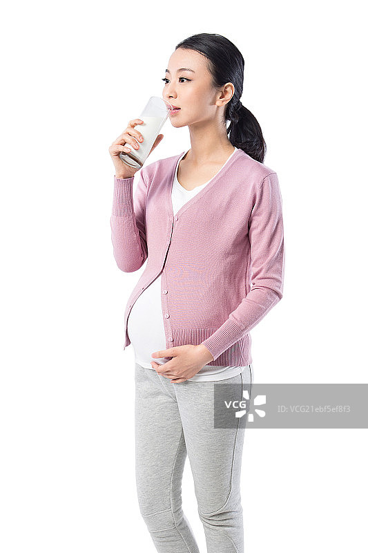 手拿牛奶的孕妇图片素材