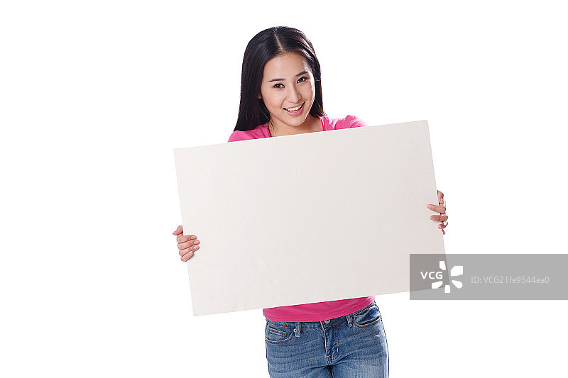 青春活力的年轻女孩拿着白板图片素材