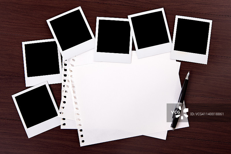 螺旋笔记本与空白照片打印图片素材