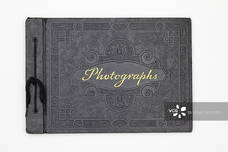 采购产品古董摄影书封面，旧的黑色皮革相簿图片素材