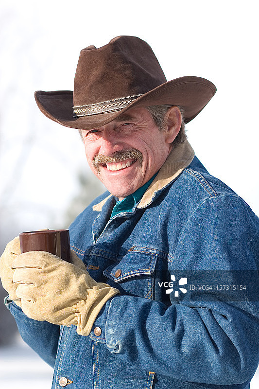 微笑的牛仔咖啡图片素材