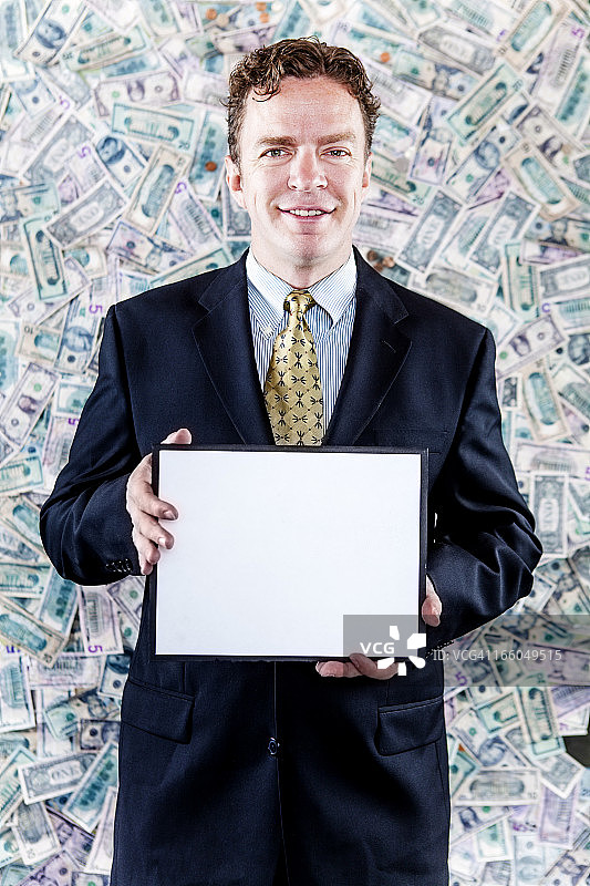 金钱商人系列:举着一个牌子图片素材