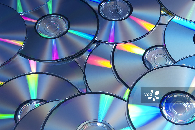 堆叠CD/DVD纹理背景的蓝色图像图片素材