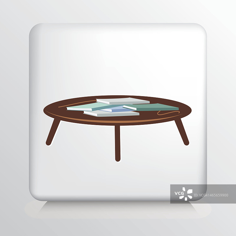 方形图标和五本书在棕色的圆咖啡桌上图片素材