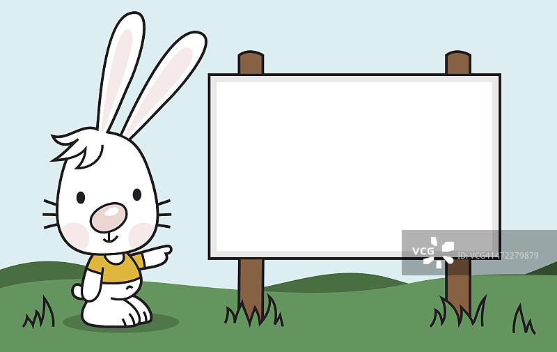 微笑的兔子指着一个空白的标志图片素材