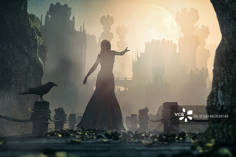 童话般的公主在夜晚站在古老的城堡前图片素材
