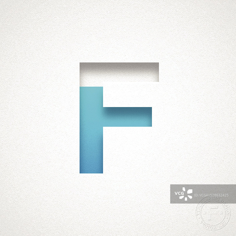 字母F设计-蓝色字母在水彩纸上图片素材