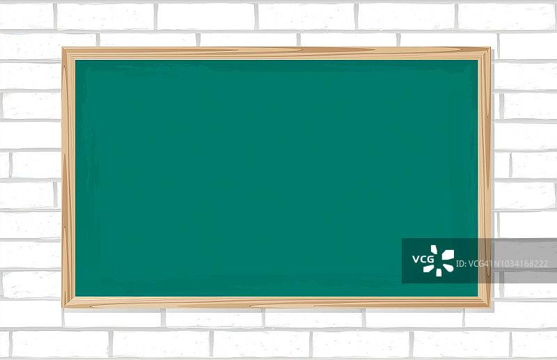 白砖背景上的绿色黑板图片素材