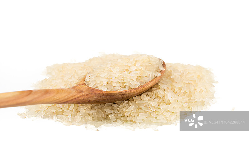 一勺大米在膨化的大米谷物背景近处图片素材