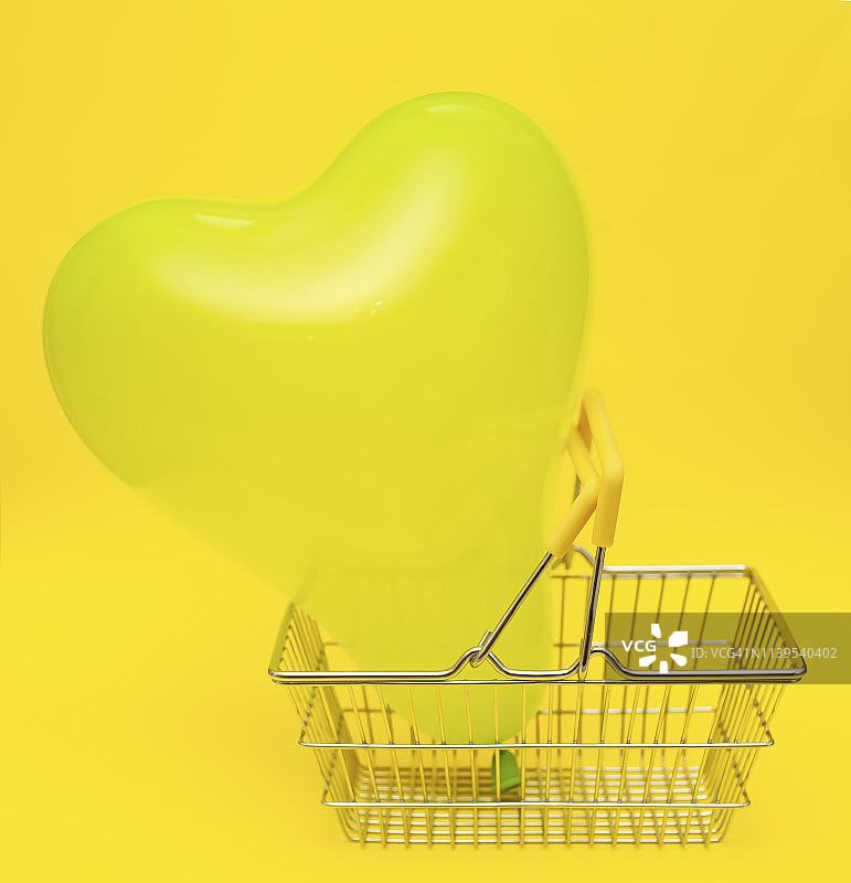购物篮里的黄色心形气球图片素材