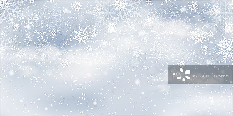 圣诞背景与坠落在蓝天。圣诞卡片。向量图片素材