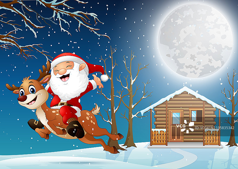 圣诞老人骑着驯鹿穿过夜晚的村庄图片素材