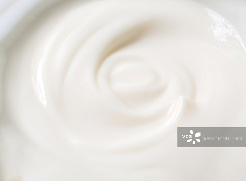 酸奶。特写希腊奶油，酸奶质地的背景。图片素材