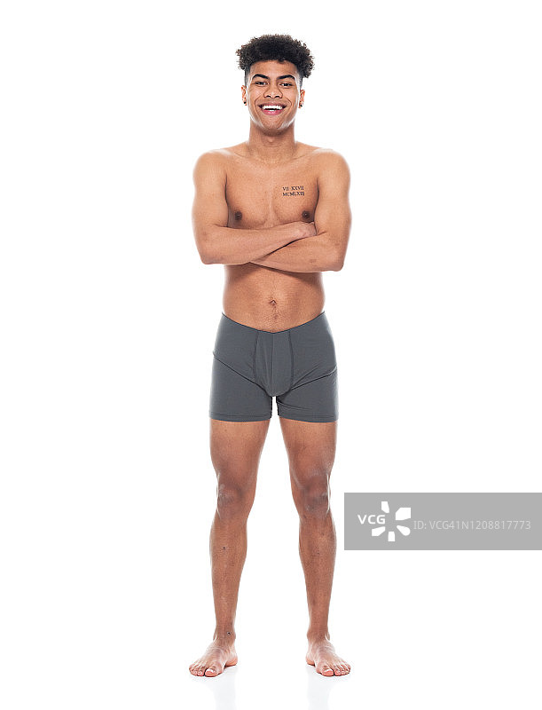 非裔美国青年男性穿着内衣站在白色背景前图片素材