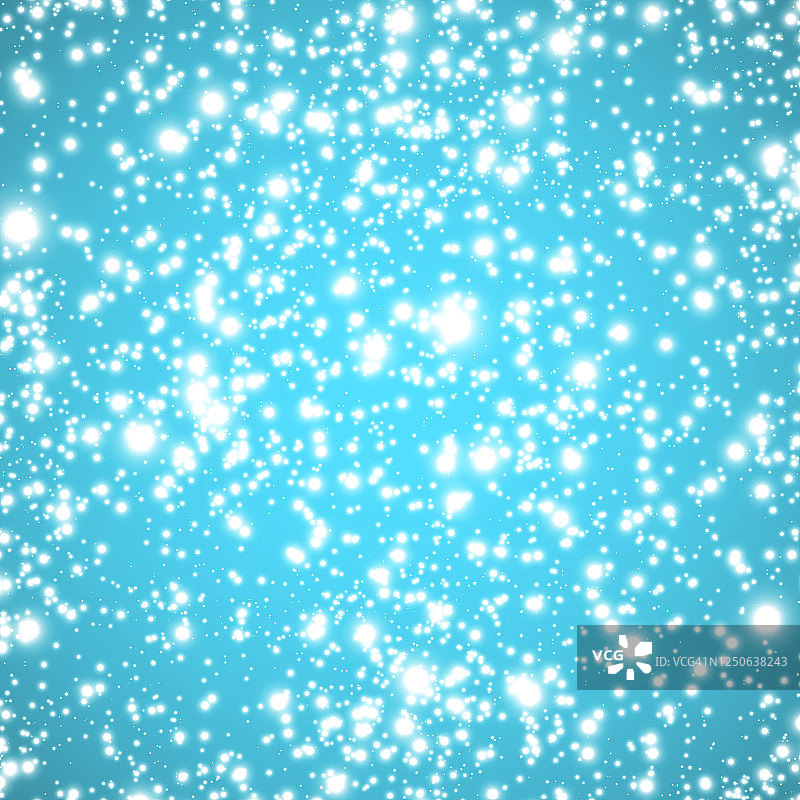 雪花落在蓝色的背景上图片素材