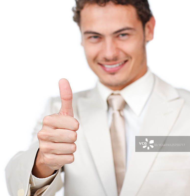 一个微笑的商人大拇指向上的特写图片素材