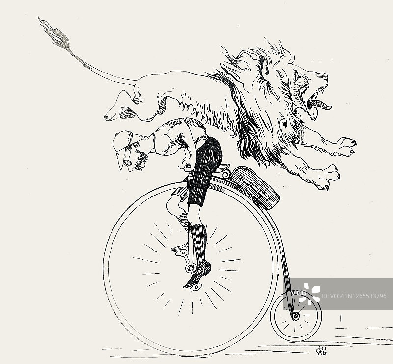 一名艺术自行车手和一只跳在他身上的狮子图片素材