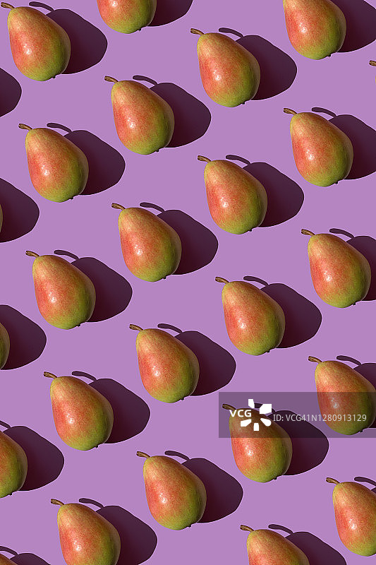 紫色背景上重复的梨图片素材