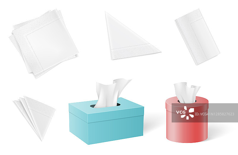 一套折叠成不同形式的餐巾纸和纸巾，放在盒子里图片素材