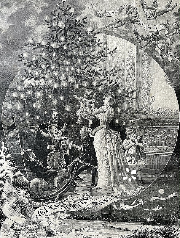 一家人在圣诞树下图片素材