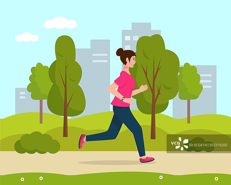 一个年轻女子在城市公园里跑步。图片素材