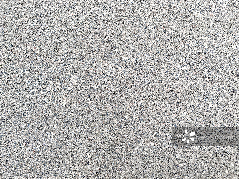 灰色的新柏油路用小石子铺实。背景。纹理图片素材