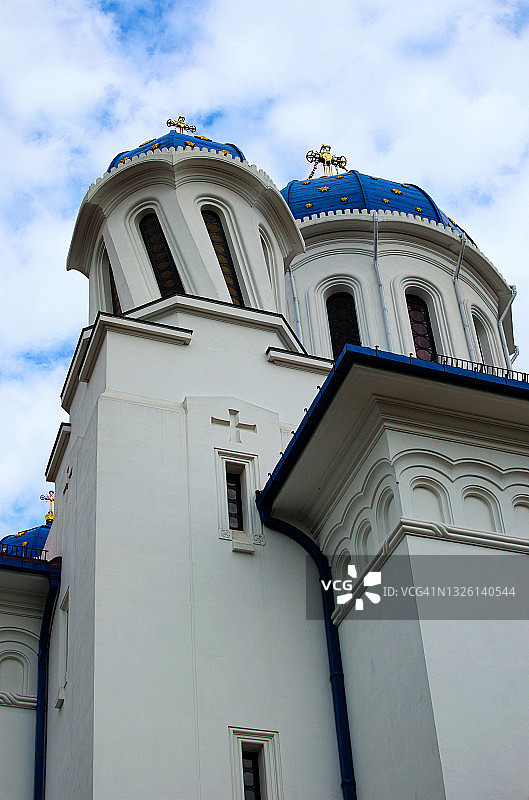切尔尼夫茨的圣尼古拉斯教堂的详细视图。蓝色的天空背景。罗马尼亚风格的neorominesk。乌克兰布科维纳切尔尼夫茨的东正教教堂图片素材