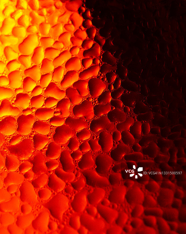 鲜亮橙色凝结的抽象图像图片素材