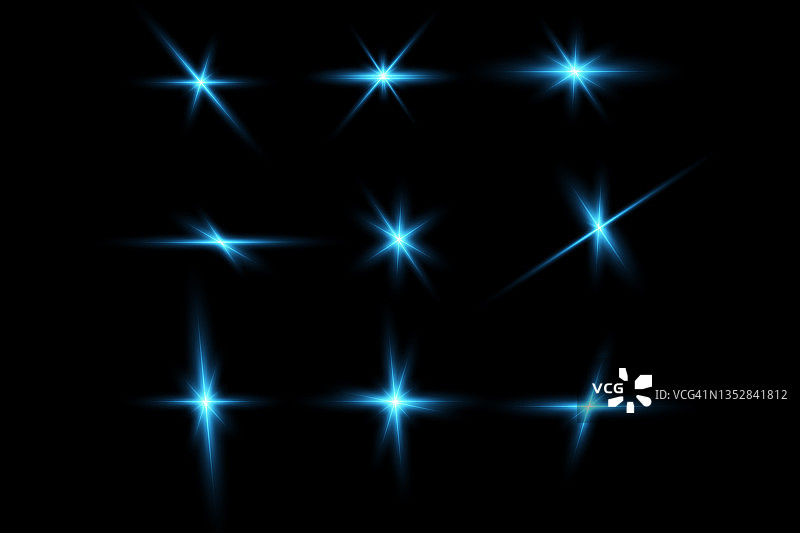 蓝色星星发出明亮光芒的效果。光粒子。图片素材
