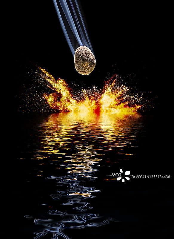 陨石撞击和爆炸在水面上的黑色背景。图片素材